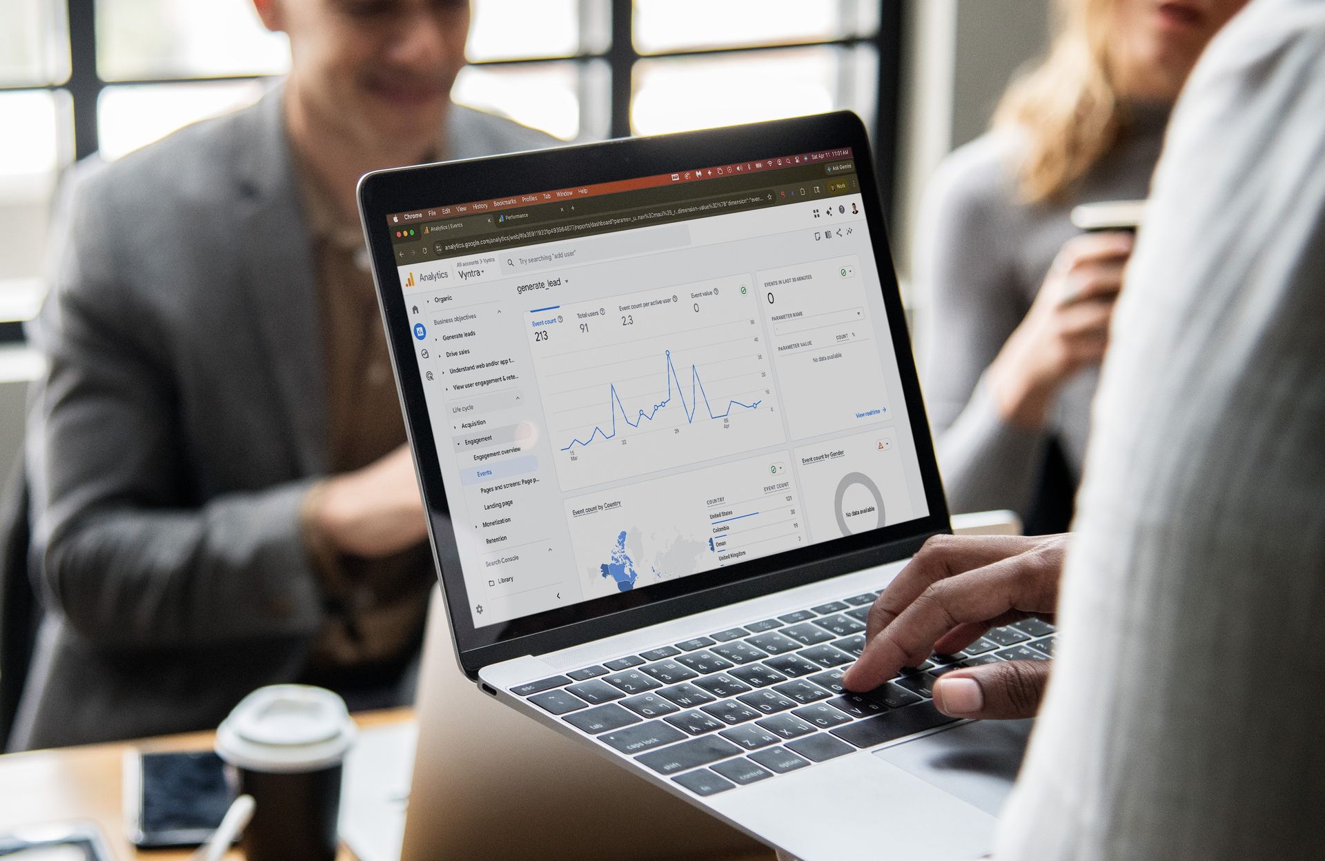 A handheld laptop showing outstanding marketing data